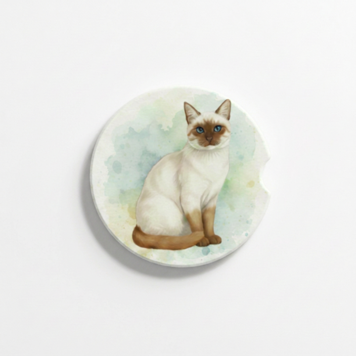 Single round ceramic car coaster featuring a watercolor-style illustration of a Siamese cat with a color point coat, sold individually.
