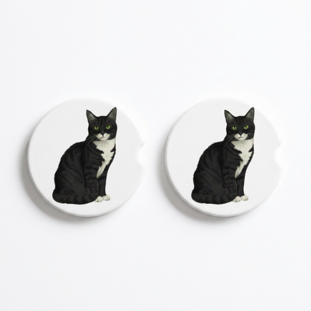 Set of two round ceramic car coasters featuring a watercolor-style illustration of an American Shorthair cat with a black tabby coat.