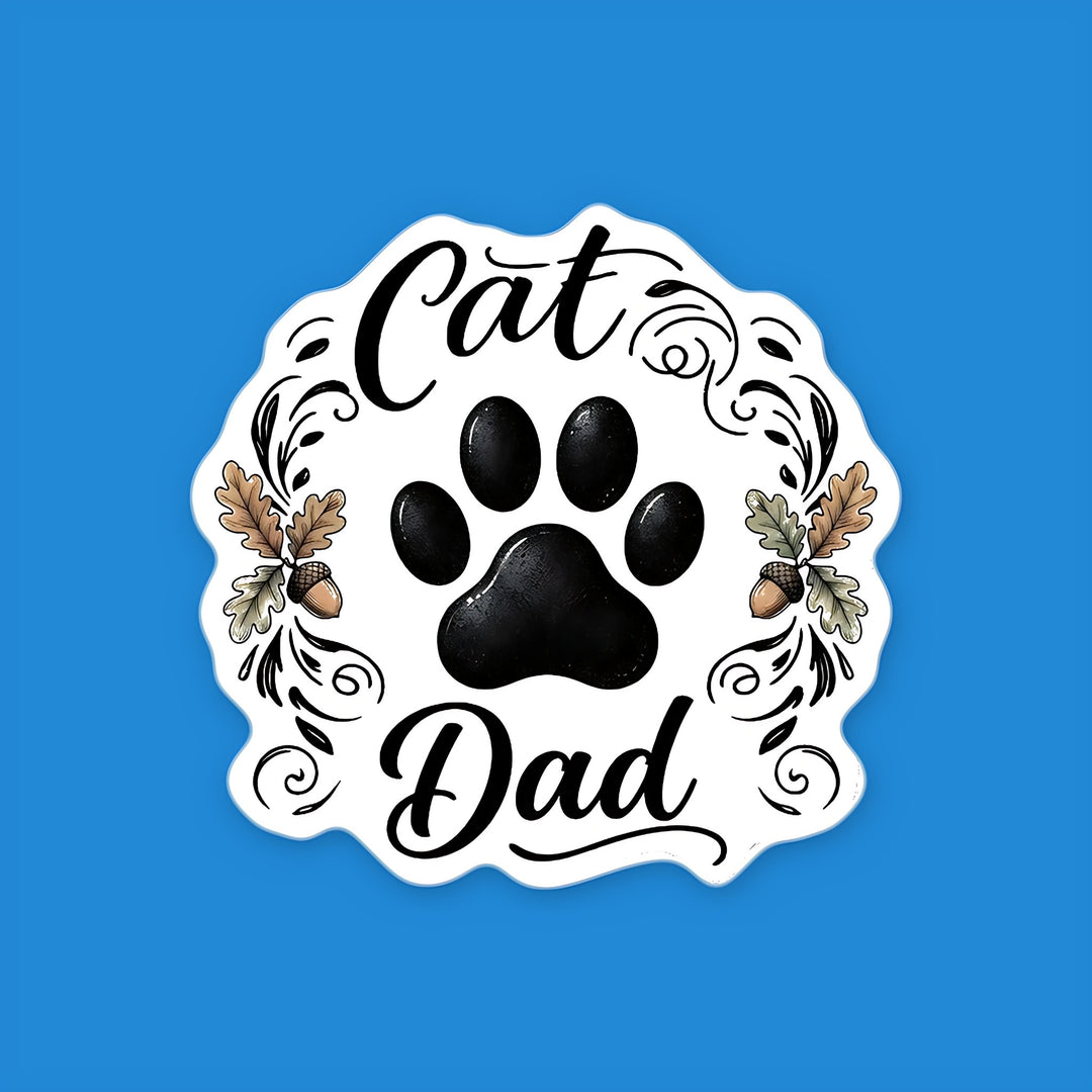 Cat Dad vinyl sticker with a black paw print, script lettering, oak leaves and acorns – Designs by Mysh