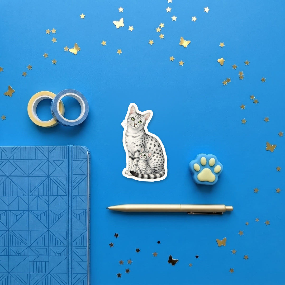 Egyptian Mau cat and kitten 3 inch sticker flat lay with blue and yellow stationery – Designs by Mysh
