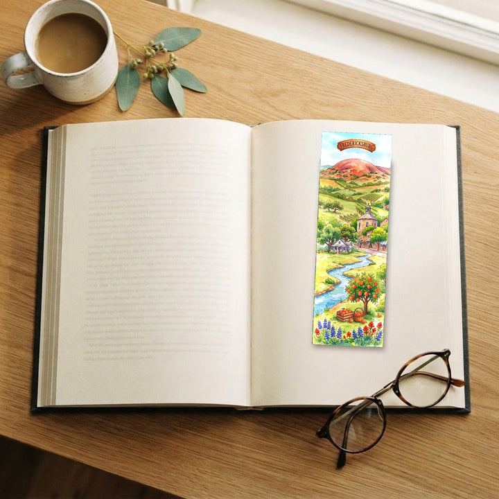Fredericksburg Texas watercolor traditional bookmark on an open book with coffee and glasses - Designs by Mysh