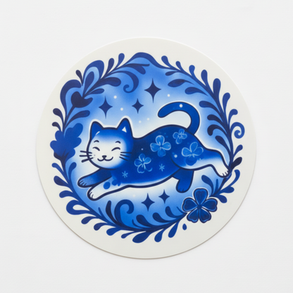 Decorative coaster with a blue cat design on a white background