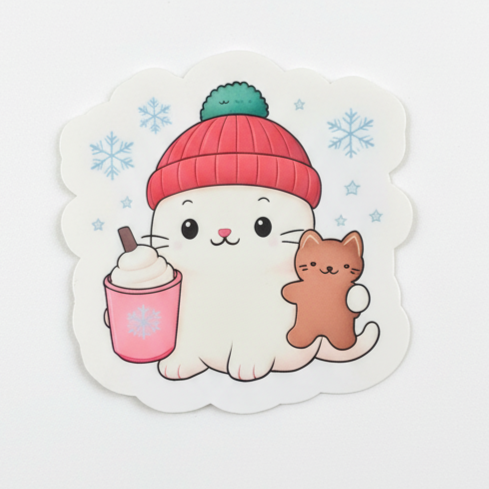 Sticker of a cute illustration of a cat wearing a red hat with a pink drink and small brown bear, on a light gray background.