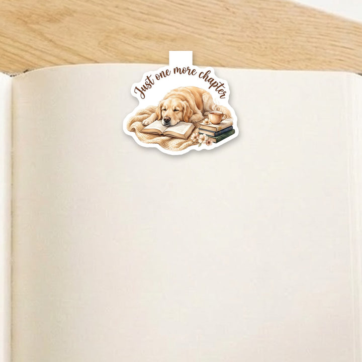 "Just one more chapter" Golden Retriever magnetic bookmark clipped over the top of an open book page – Designs by Mysh