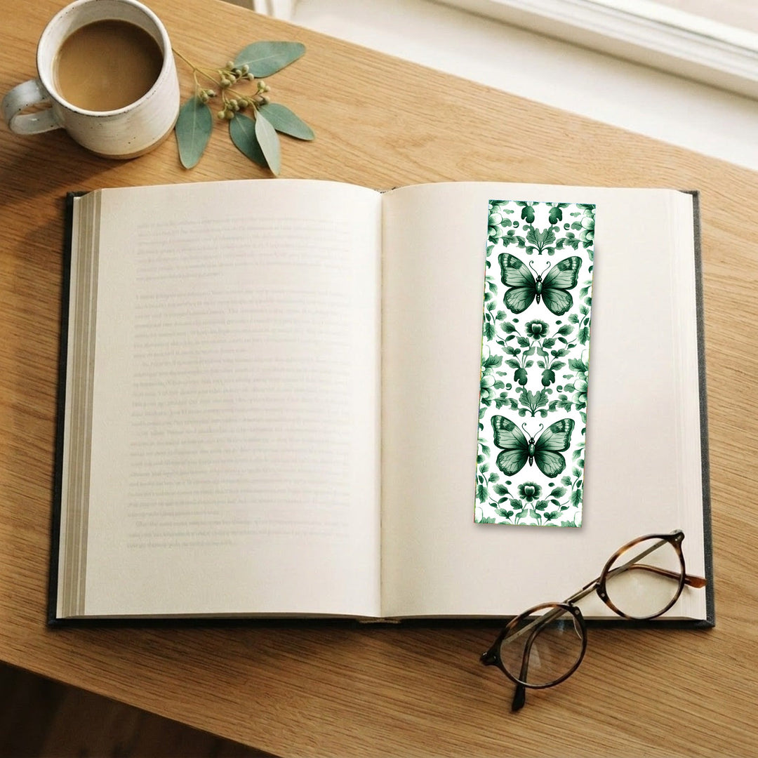 Green Butterfly Chinoiserie bookmark on an open book with coffee and glasses - Designs by Mysh