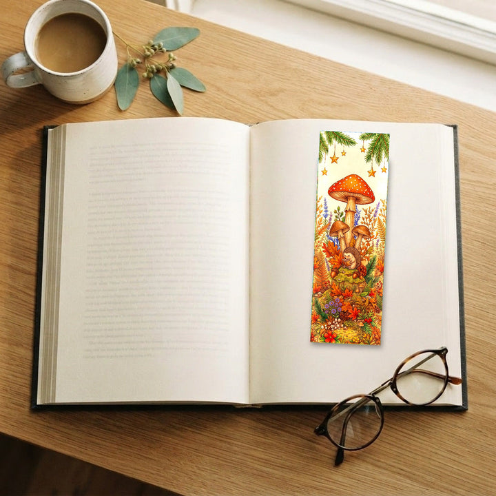 Hedgehog Mushroom Reading bookmark on an open book with coffee and glasses - Designs by Mysh