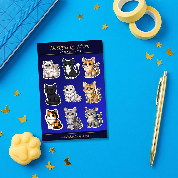 Kawaii Cats sticker sheet flat lay with blue and yellow stationery – Designs by Mysh