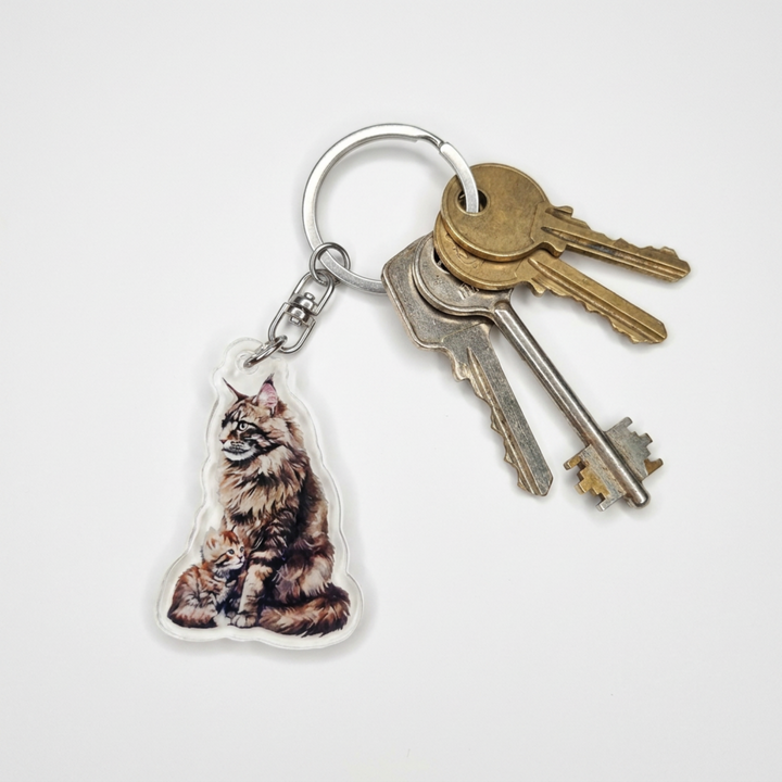 Brown tabby Maine Coon cat and kitten acrylic keychain attached to a keyring with house keys