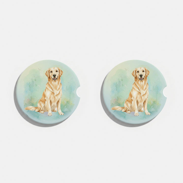 Set of two round ceramic car coasters featuring a watercolor-style illustration of a light golden retriever on a soft pastel wash.