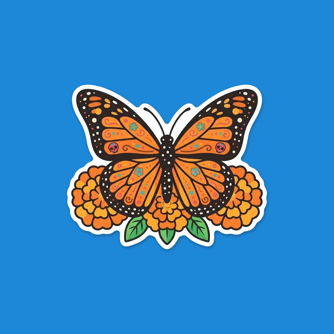 Monarch butterfly with sugar skull wing details resting on marigolds Día de los Muertos vinyl sticker – Designs by Mysh