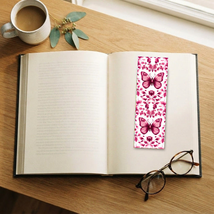 Pink Butterfly Chinoiserie bookmark on an open book with coffee and glasses - Designs by Mysh