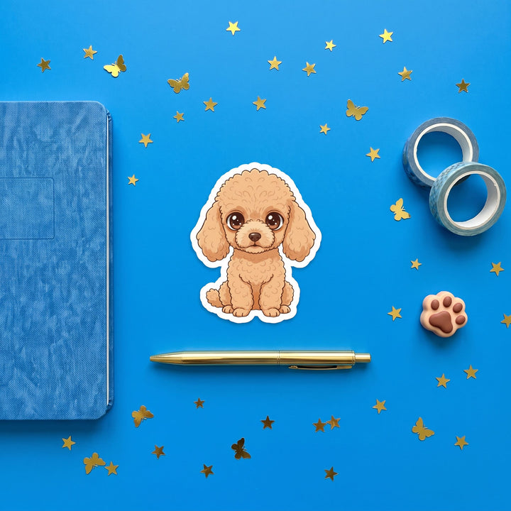 Poodle Apricot Kawaii Sticker in a blue flat lay