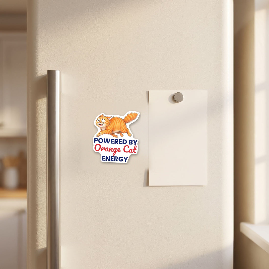 Powered By Orange Cat Energy orange cat magnet on a refrigerator door