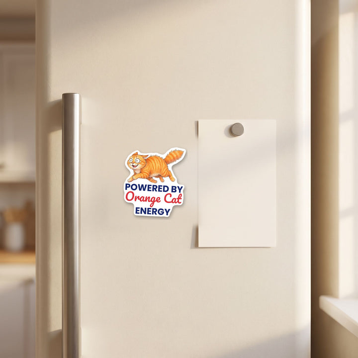 Powered By Orange Cat Energy orange cat magnet on a refrigerator door