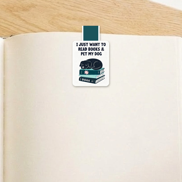 "I just want to read books and pet my dog" black dog magnetic bookmark clipped over the top of an open book page – Designs by Mysh