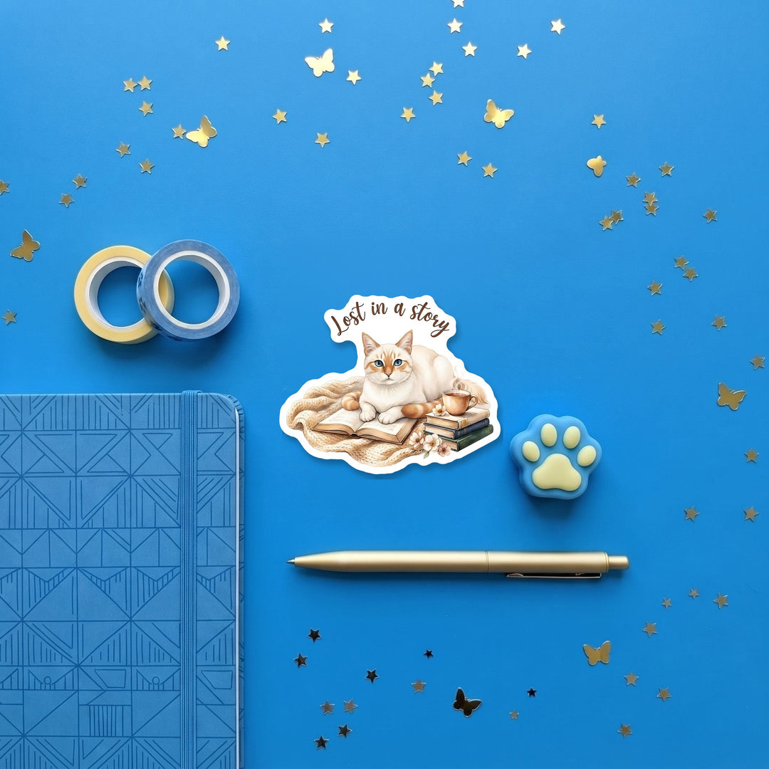 Siamese bookish magnet flat lay with stationery