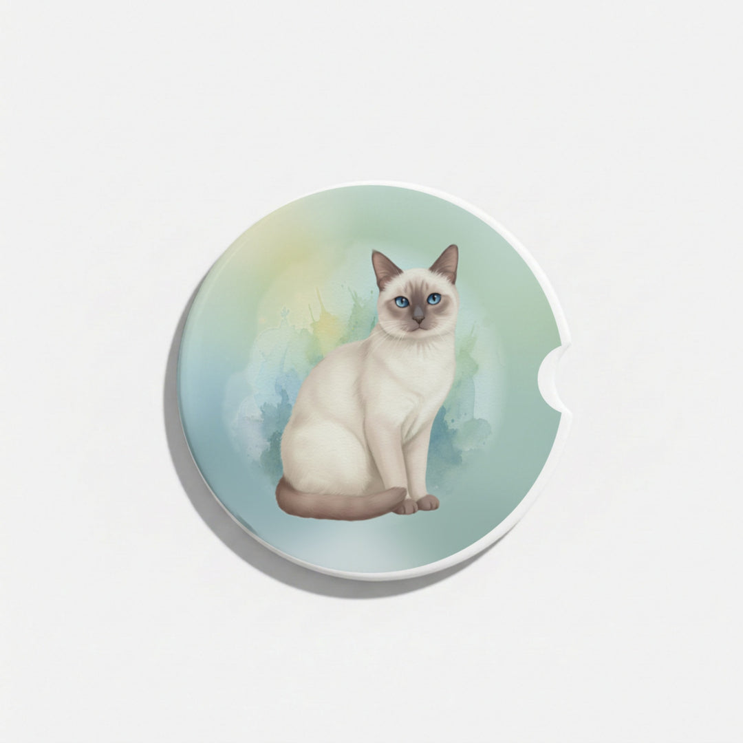 Single round ceramic car coaster featuring a watercolor-style illustration of a Siamese cat with a lilac point coat, sold individually.