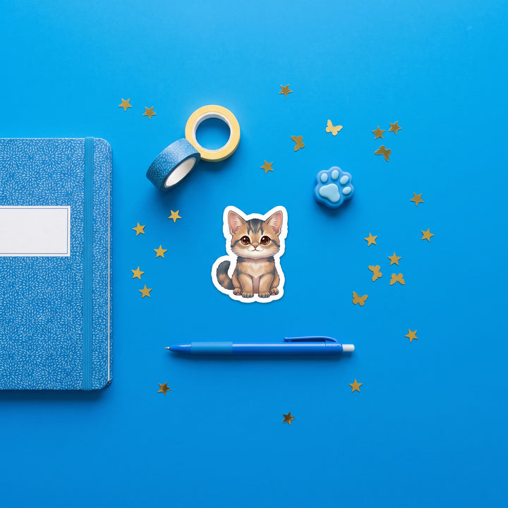 Somali Blue Kawaii Sticker brand flat lay - Designs by Mysh