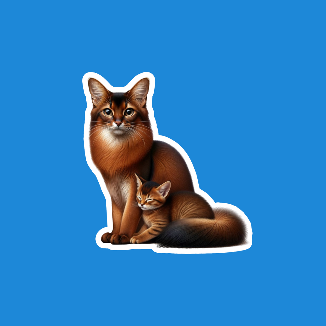 A die-cut vinyl sticker featuring an illustration of a large brown cat sitting behind a smaller orange tabby kitten, shown on a solid blue background.