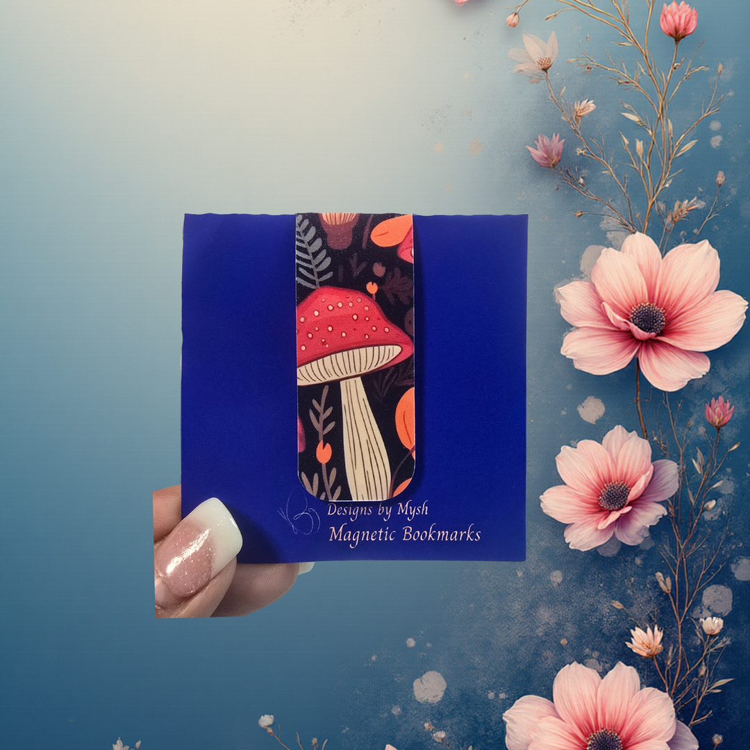 Magnetic bookmarks packaging with mushroom design on a blue background, surrounded by flowers.