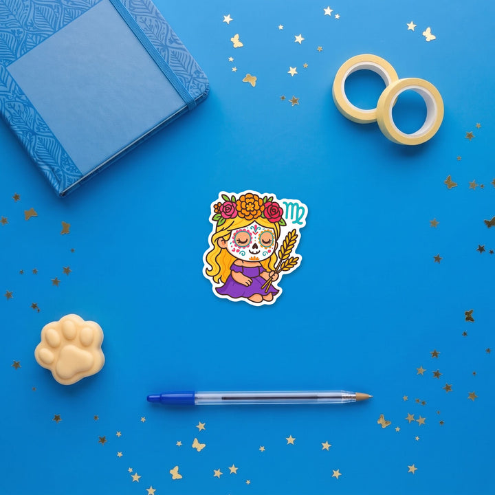 Virgo sugar skull girl 3 inch sticker flat lay with blue and yellow stationery – Designs by Mysh
