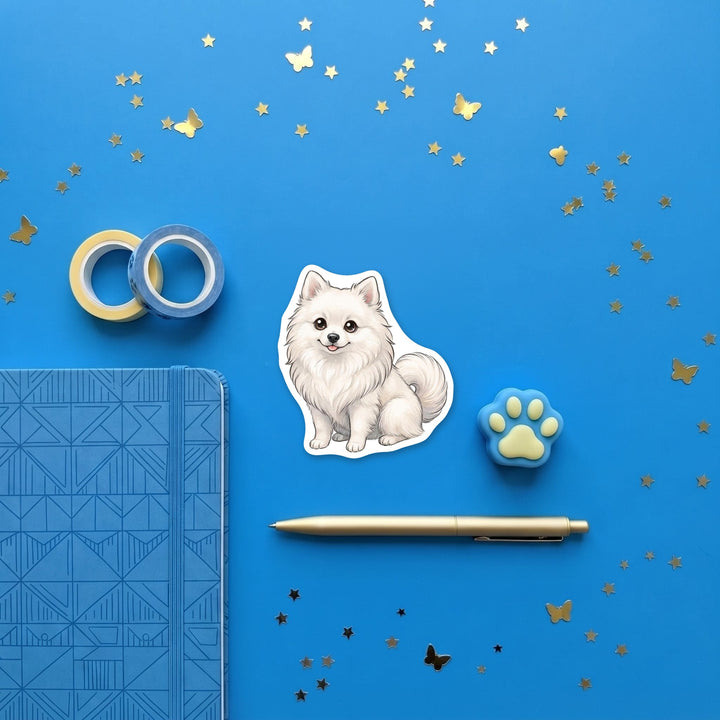 Volpino Italiano White kawaii 3 inch sticker flat lay with blue and yellow stationery – Designs by Mysh
