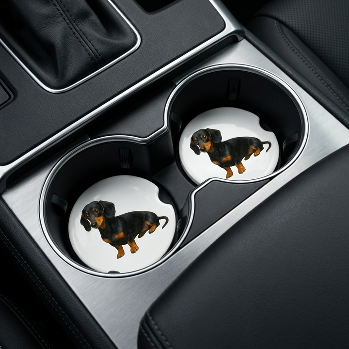 Dachshund car coasters with a black and tan coat placed in a vehicle&