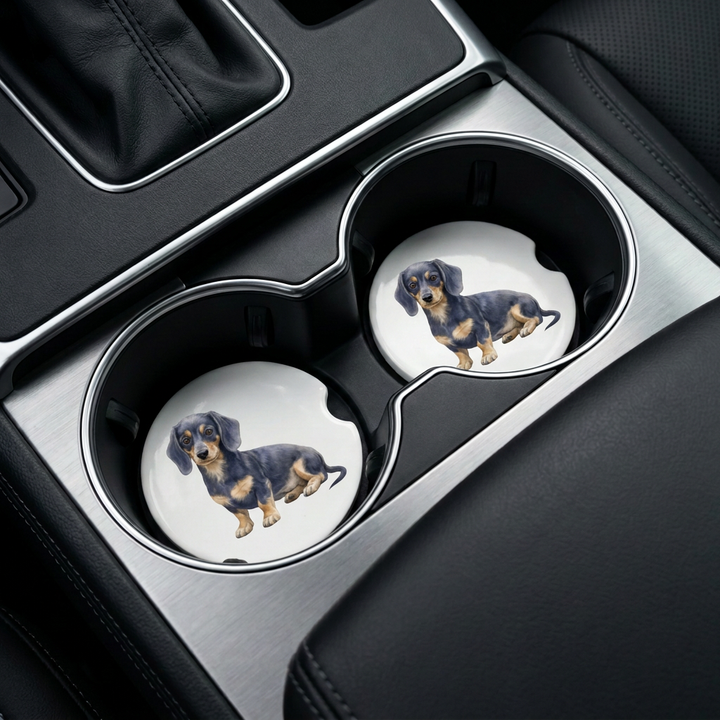 Dachshund car coasters with a blue and tan coat placed in a vehicle&