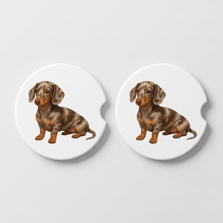 Set of two round ceramic car coasters featuring a watercolor-style illustration of a Dachshund with a chocolate dapple coat.