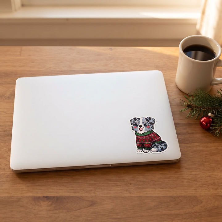 Blue merle Australian Shepherd ugly Christmas sweater kawaii sticker on a laptop lid – Designs by Mysh