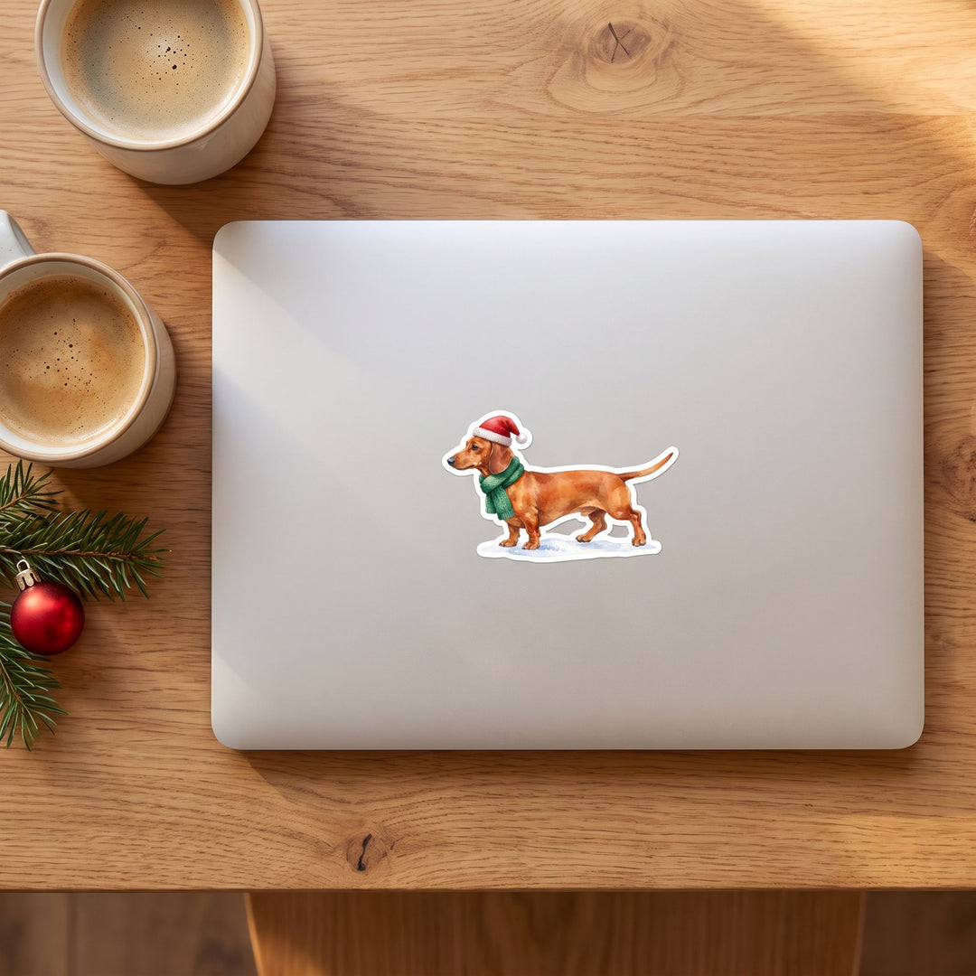 Watercolor Dachshund in a Santa hat sticker on a laptop lid – Designs by Mysh