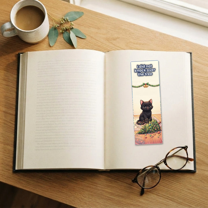 I Did Not Knock Over the Tree black cat kawaii bookmark on an open book – Designs by Mysh