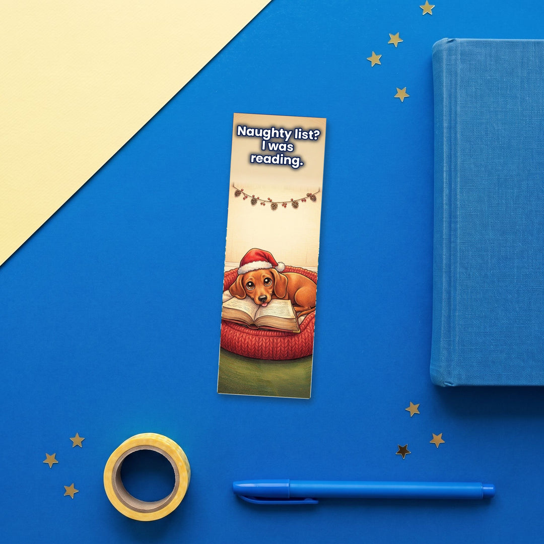 Naughty List? I Was Reading Dachshund kawaii bookmark flat lay with blue stationery – Designs by Mysh
