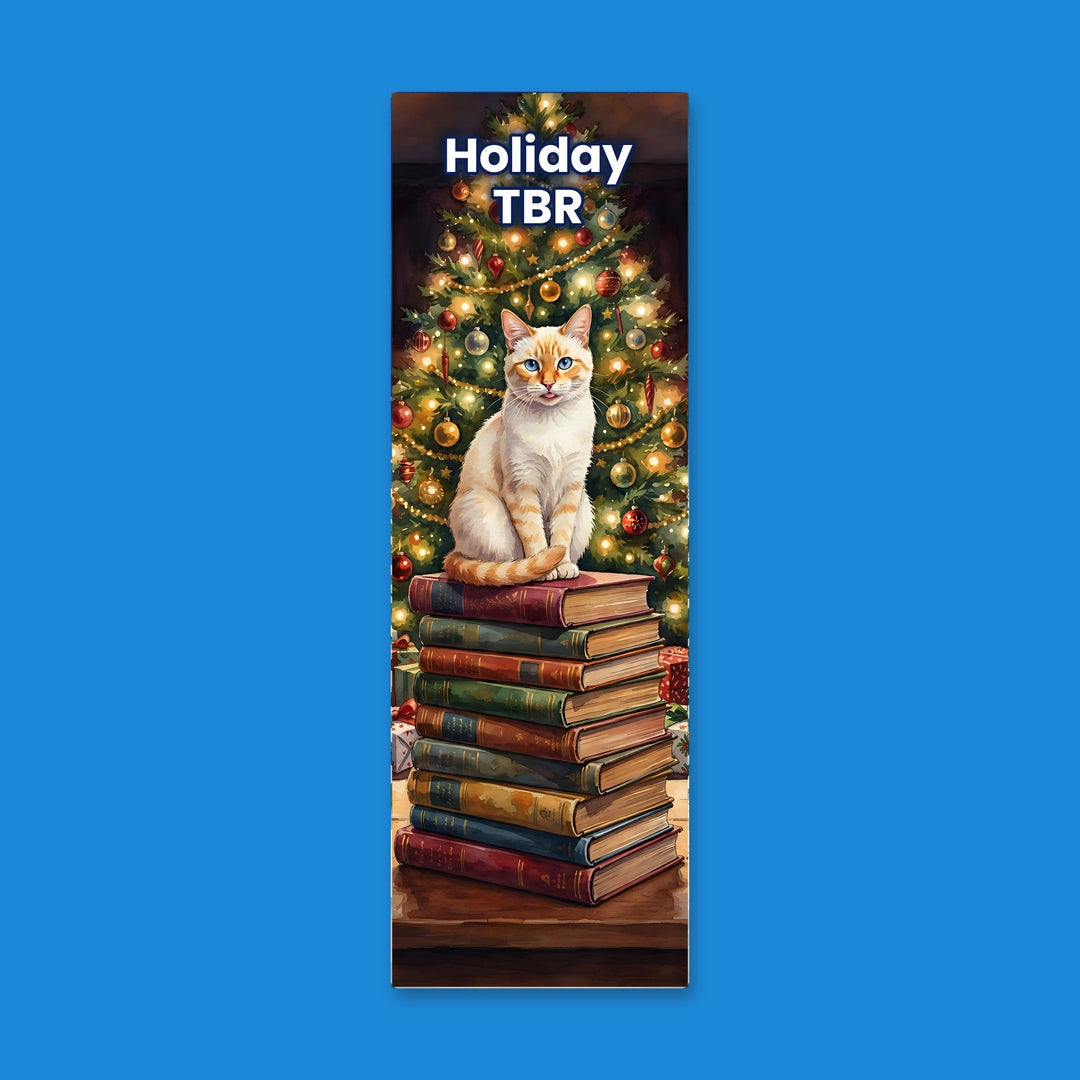 Holiday TBR watercolor bookmark with flame point Siamese cat on a book stack by the Christmas tree – Designs by Mysh