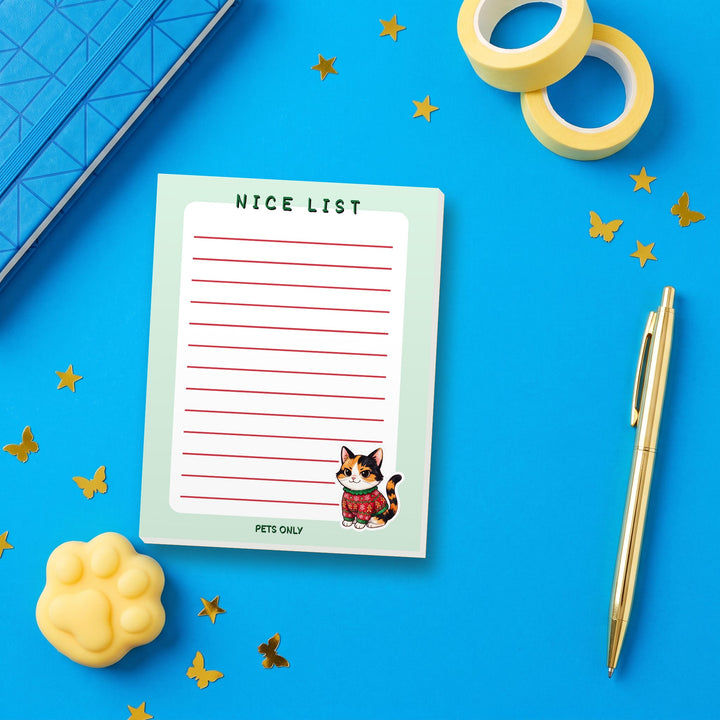 Nice List Pets Only notepad flat lay with blue and yellow stationery – Designs by Mysh