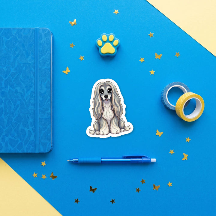 Afghan Hound Grey Blue Cream kawaii 3 inch sticker flat lay with blue and yellow stationery – Designs by Mysh