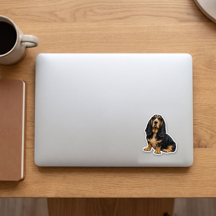 Basset Hound Black and Tan watercolor vinyl sticker on a laptop lid – Designs by Mysh