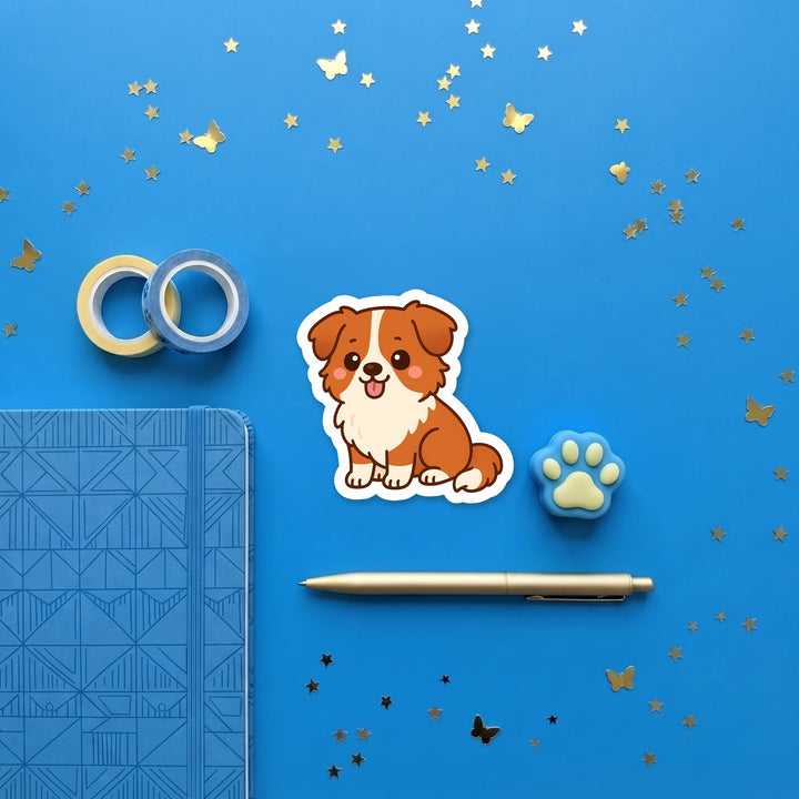 Australian Shepherd Red and White kawaii 3 inch sticker flat lay with blue and yellow stationery – Designs by Mysh