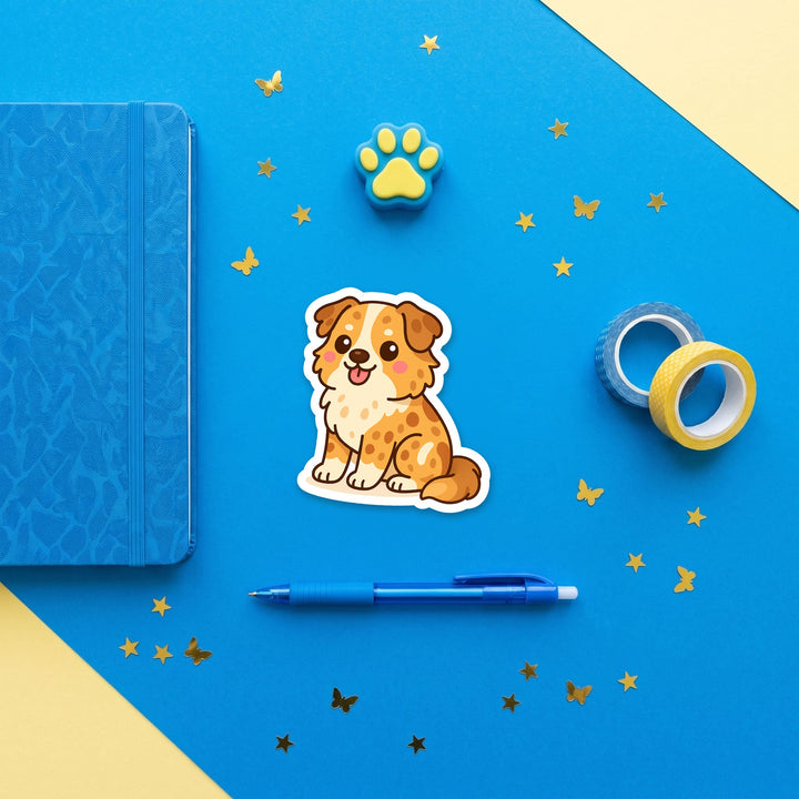 Australian Shepherd Red Merle kawaii 3 inch fridge magnet flat lay with blue and yellow stationery – Designs by Mysh
