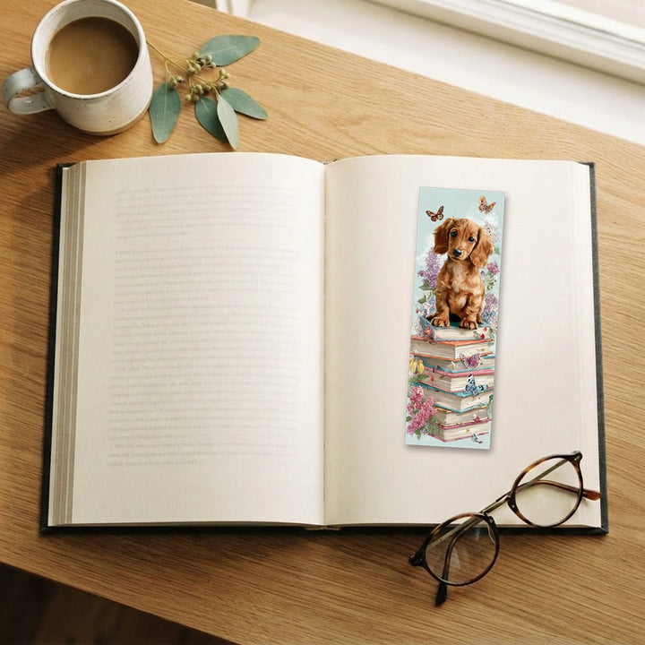 Dachshund on a Bookstack traditional bookmark on an open book – Designs by Mysh