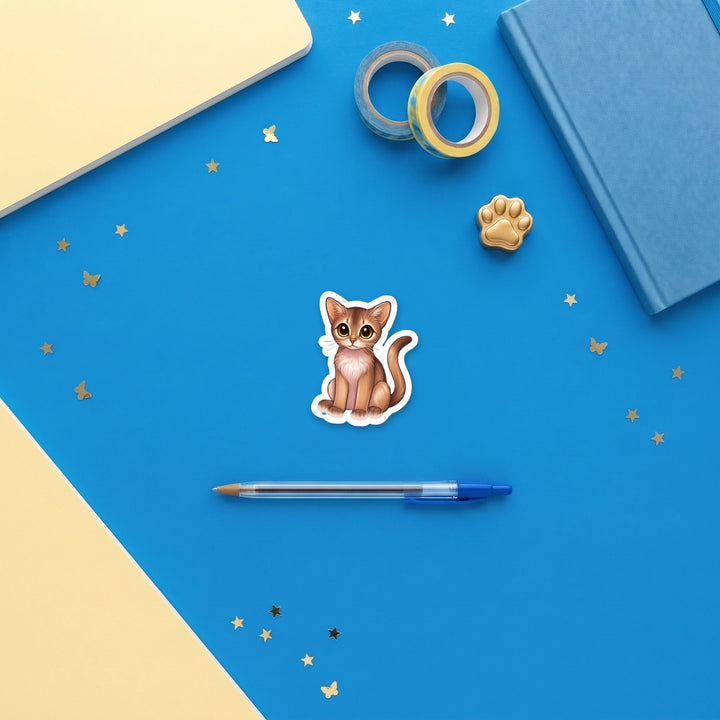 Abyssinian Fawn kawaii 3 inch fridge magnet flat lay with blue and yellow stationery – Designs by Mysh