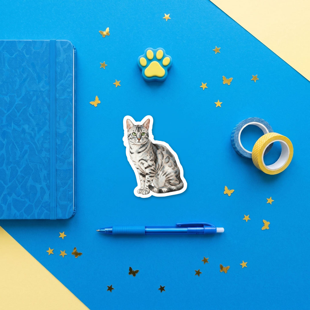 Bengal Black Silver Spotted watercolor 3 inch sticker flat lay with blue and yellow stationery – Designs by Mysh
