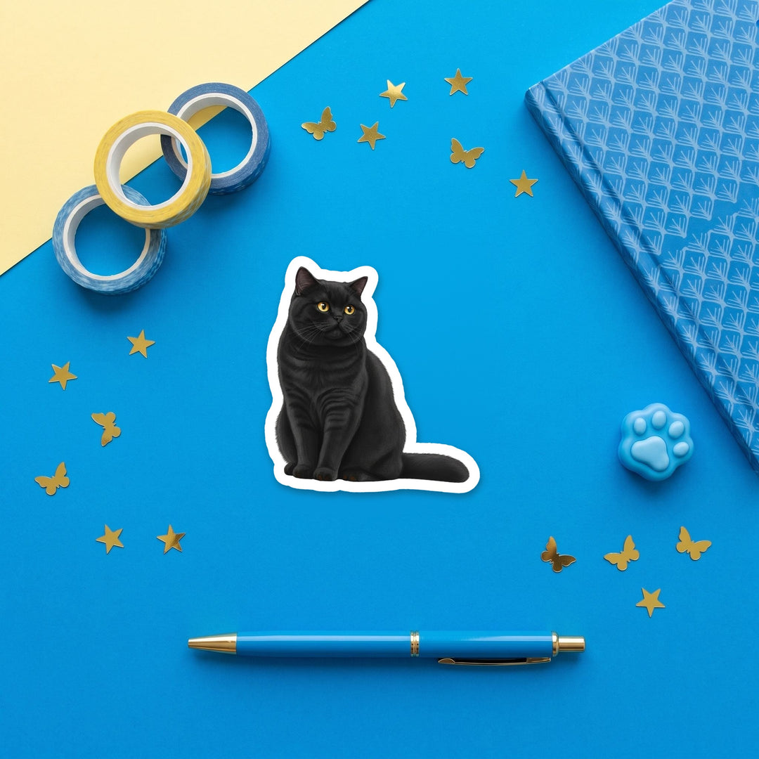 British Shorthair Black watercolor 3 inch sticker flat lay with blue and yellow stationery – Designs by Mysh
