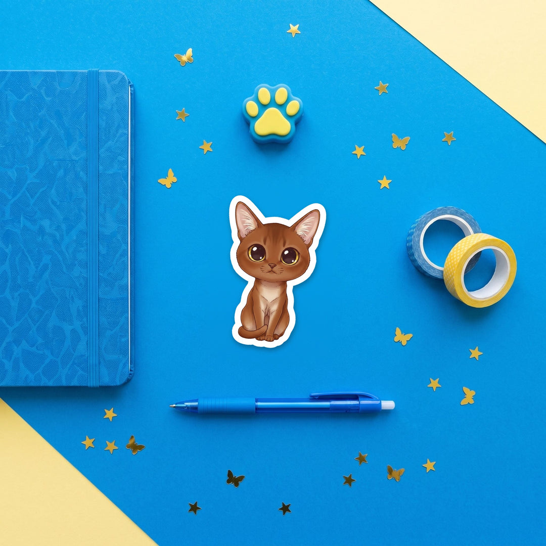 Burmese Sable kawaii 3 inch sticker flat lay with blue and yellow stationery – Designs by Mysh