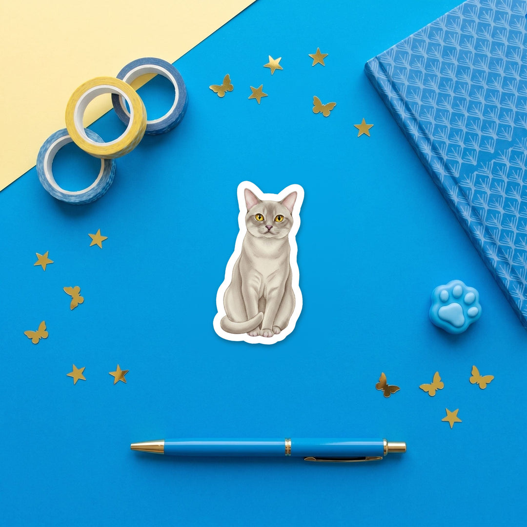Burmese Platinum watercolor 3 inch sticker flat lay with blue and yellow stationery – Designs by Mysh