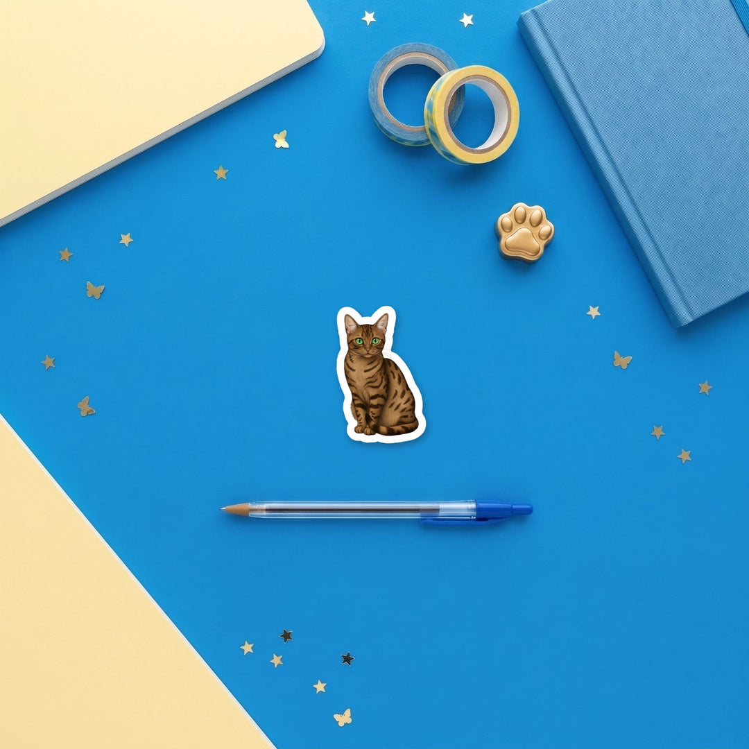 Egyptian Mau Bronze watercolor 3 inch sticker flat lay with blue and yellow stationery – Designs by Mysh