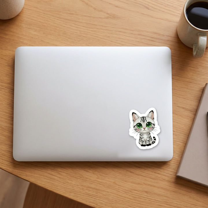 Egyptian Mau Smoke kawaii vinyl sticker on a laptop lid – Designs by Mysh