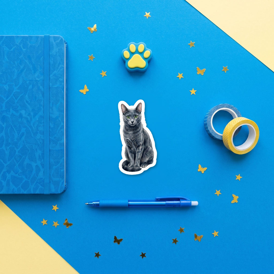 Russian Blue Darkening Blue-Gray watercolor 3 inch sticker flat lay with blue and yellow stationery – Designs by Mysh