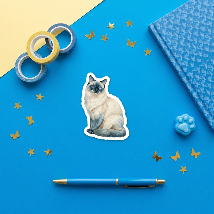 Birman Blue Point watercolor 3 inch sticker flat lay with blue and yellow stationery – Designs by Mysh