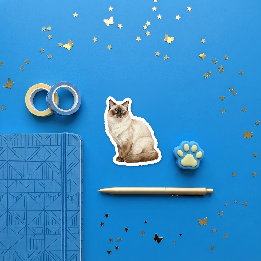 Birman Chocolate Point watercolor 3 inch sticker flat lay with blue and yellow stationery – Designs by Mysh